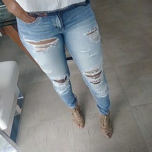 Naturally Distressed Blue Denim Jeans